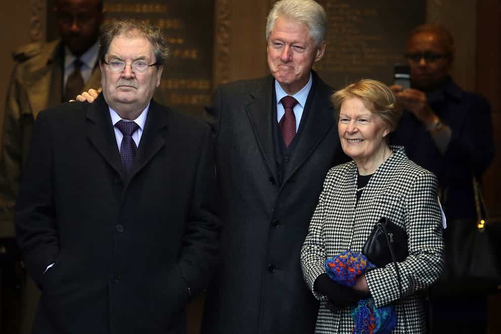 Former US president Bill Clinton (centre) with John Hume and his wife Pat