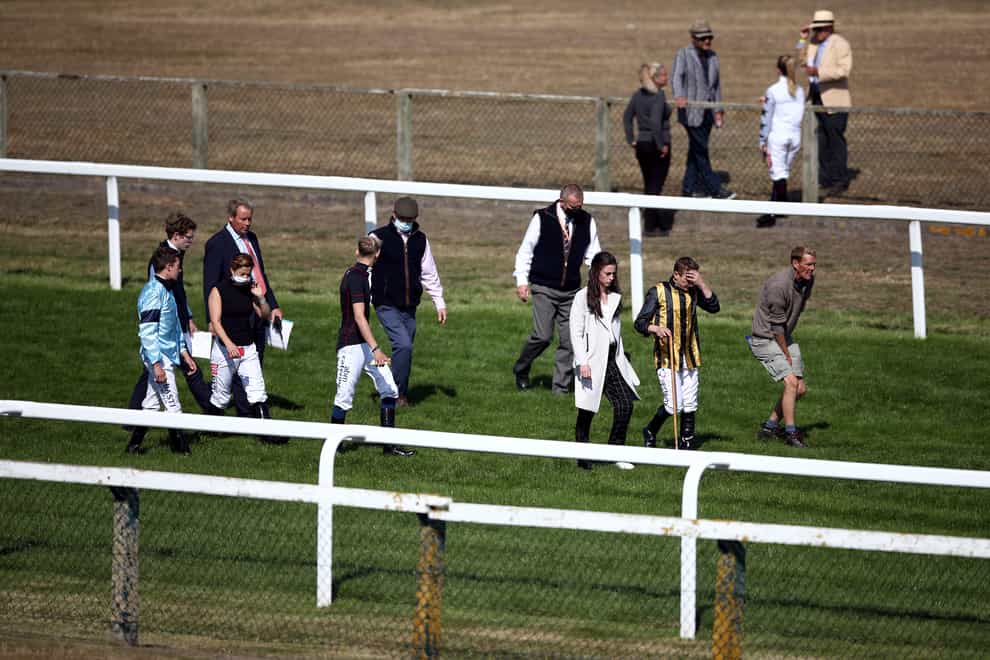 Riders inspect the ground at Yarmouth
