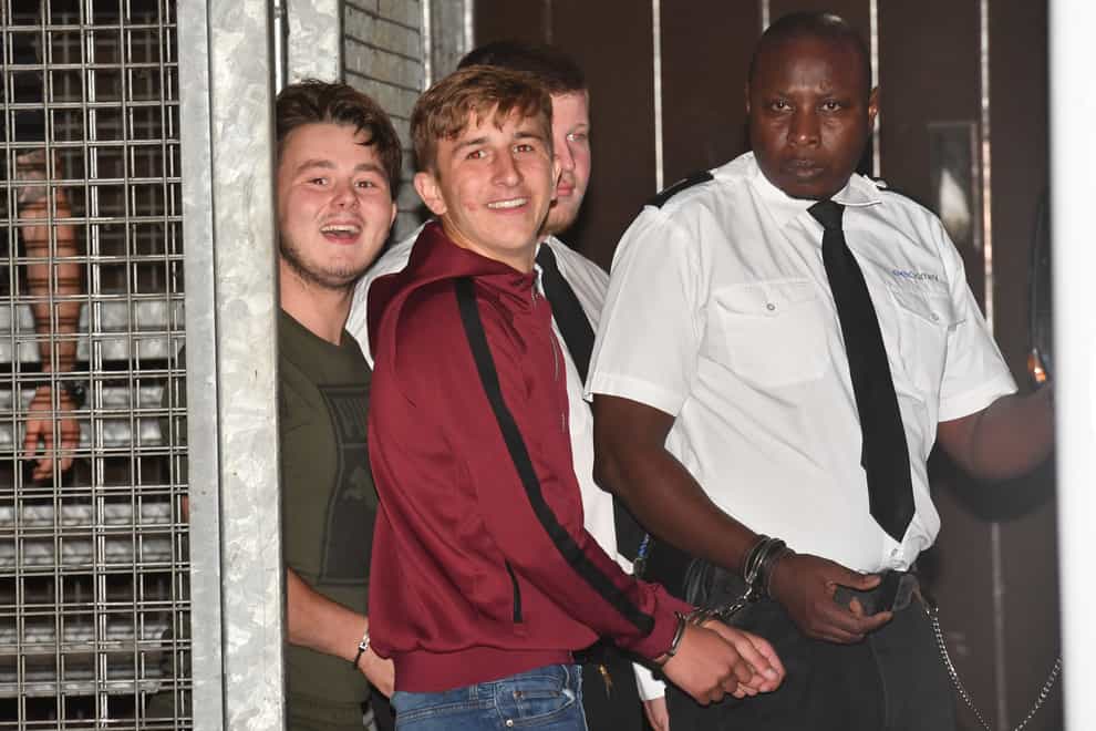 Albert Bowers, left, and Jessie Cole, centre, leaving Reading Magistrates' Court following an appearance in relation to the death of Pc Andrew Harper in September 2019