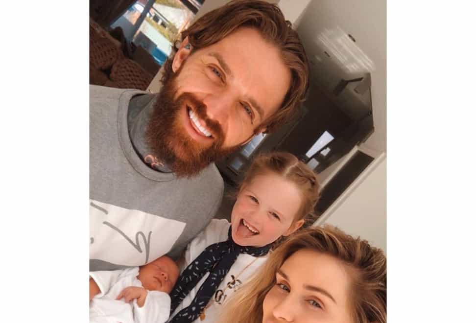 Chalmer and girlfriend Talia Oatway with newborn son and Oatway's daughter