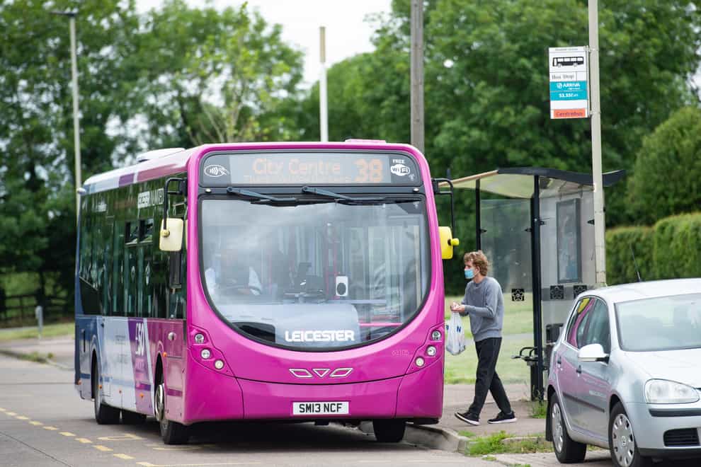 Emergency Covid-19 funding for bus and tram operators in England is being extended ahead of expected increases in demand next month, the Government has announced (Jacob King/PA)