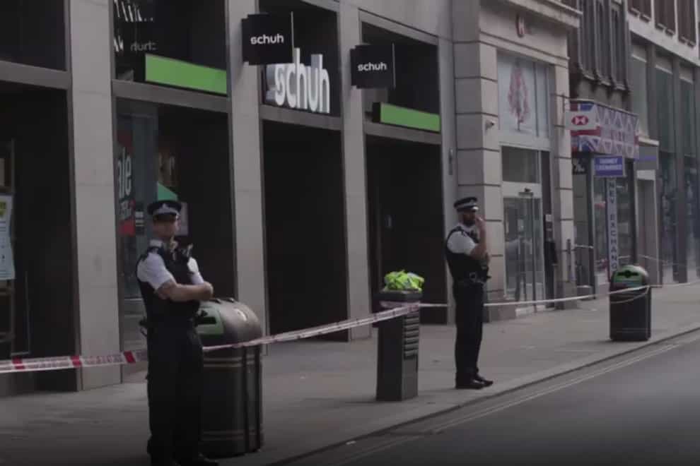 Police at the scene on London's Oxford Street