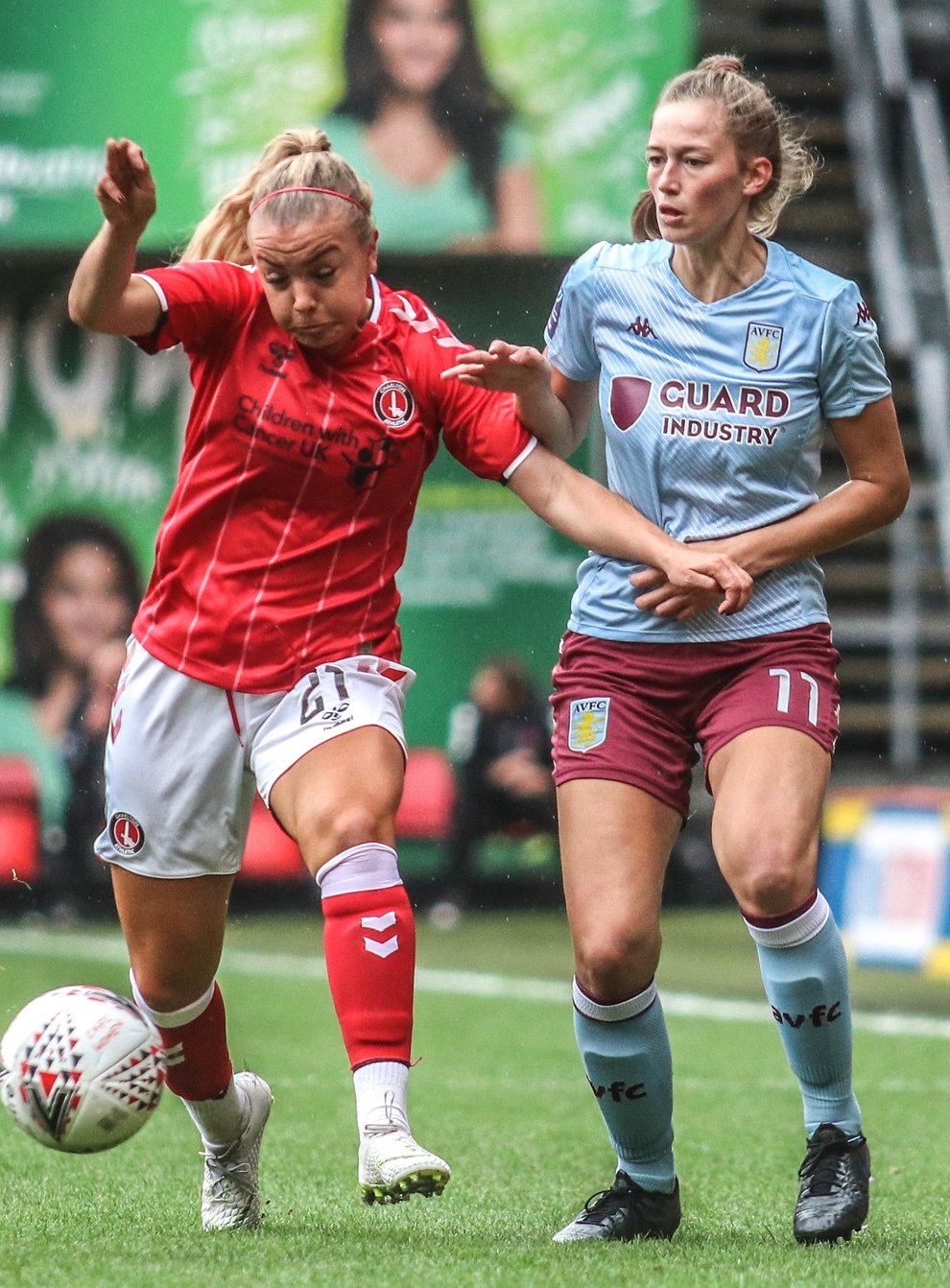Jenna Legg (left) re-signs for Charlton Athletic