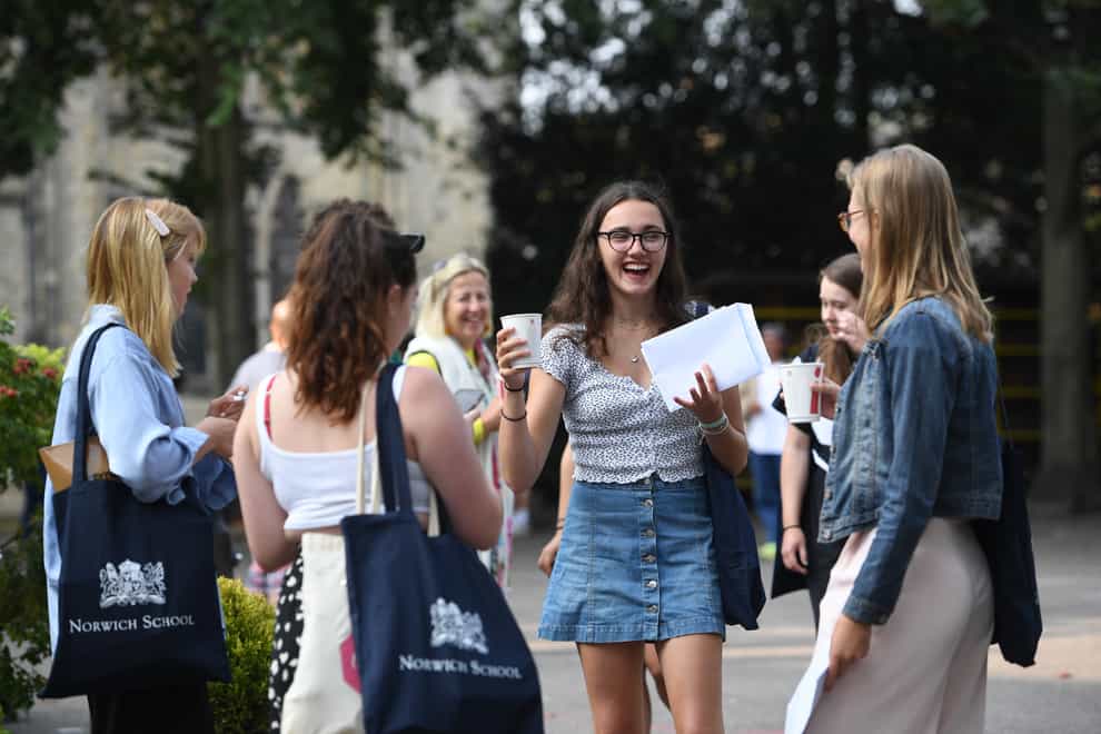 Emily Wallace, centre, reacts as students at Norwich School receive their A-level results