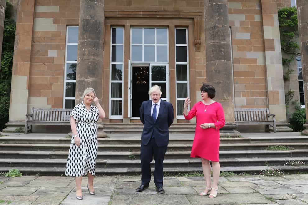 Deputy First Minister Michelle O’Neill, Prime Minister Boris Johnson and First Minister Arlene Foster at Hillsborough Castle during the Prime Minister’s visit to Belfast