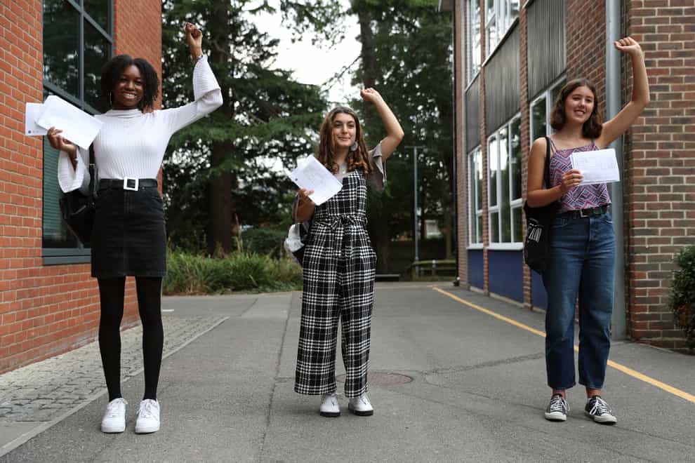 Students Gabrielle Josephs, left, Sara Al Soodi and Miriam Wilson after receiving their A-level results at Peter Symonds College, Winchester