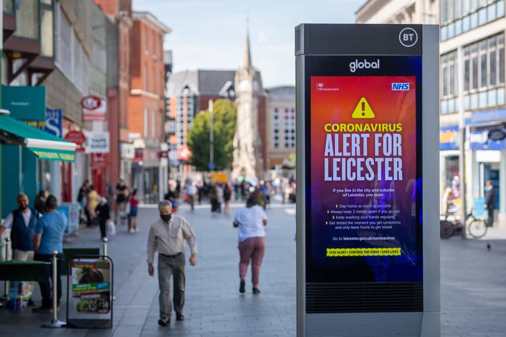 Coronavirus alert messages on a sign in the centre of Leicester