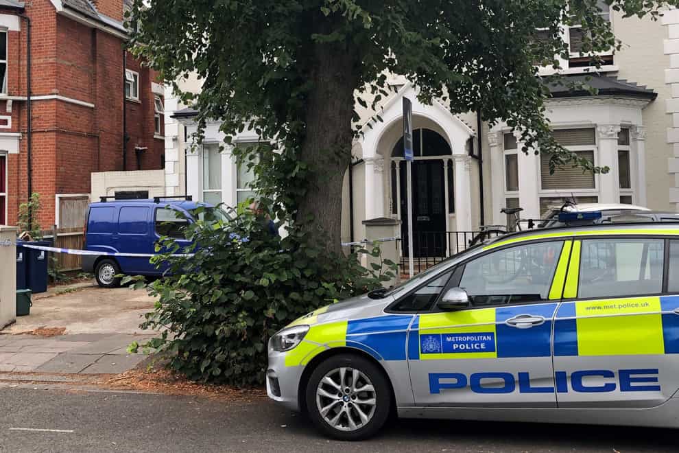 Police outside an address in Cumberland Park Acton, west London