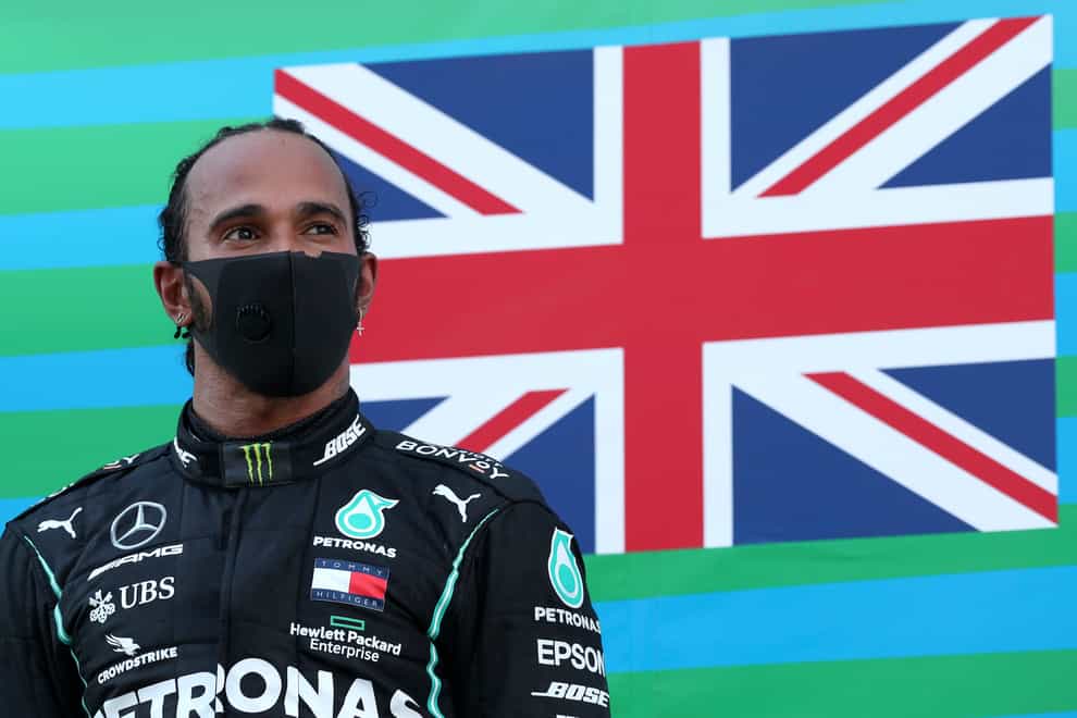 Lewis Hamilton on the Spanish Grand Prix podium following his 88th career win