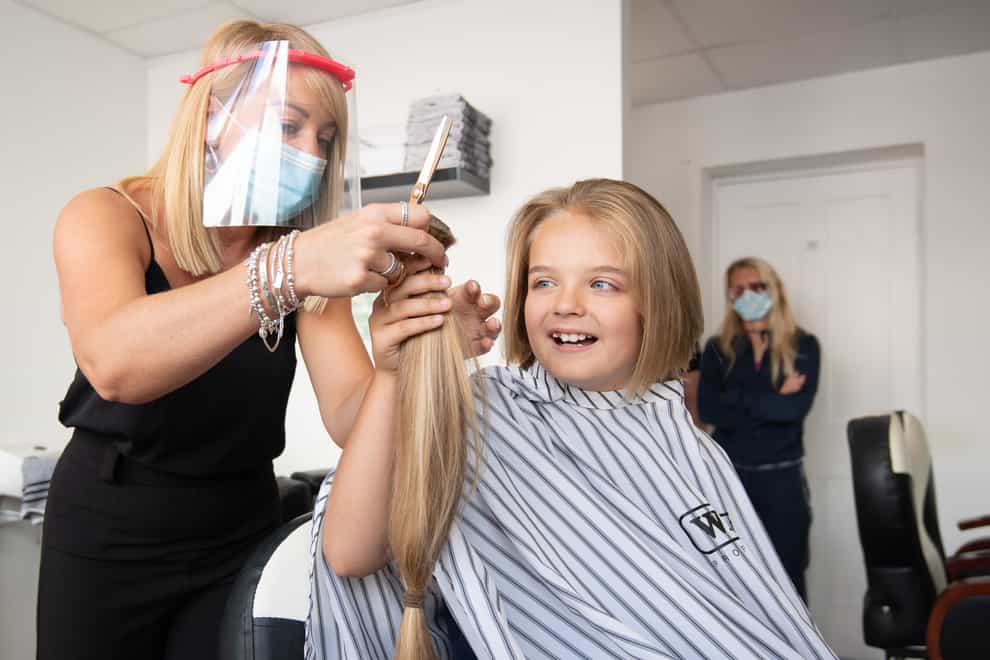 Reilly Stancombe has his first ever hair cut for charity