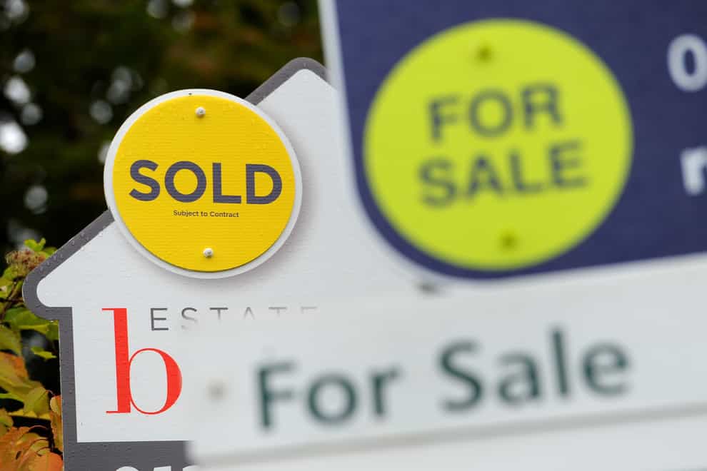 Estate agents' Sold and For Sale boards