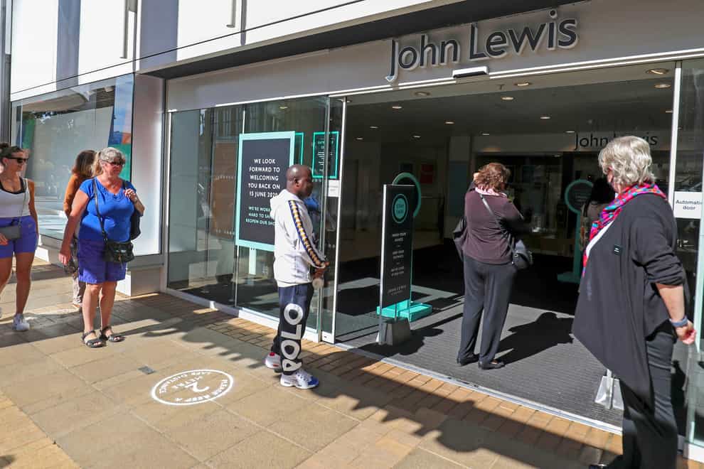 Shoppers queue outside John Lewis