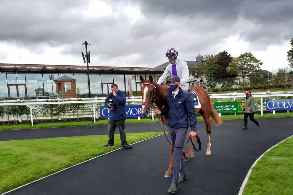Mac Swiney and Kevin Manning return after their win in the Galileo Irish EBF Futurity Stakes at the Curragh