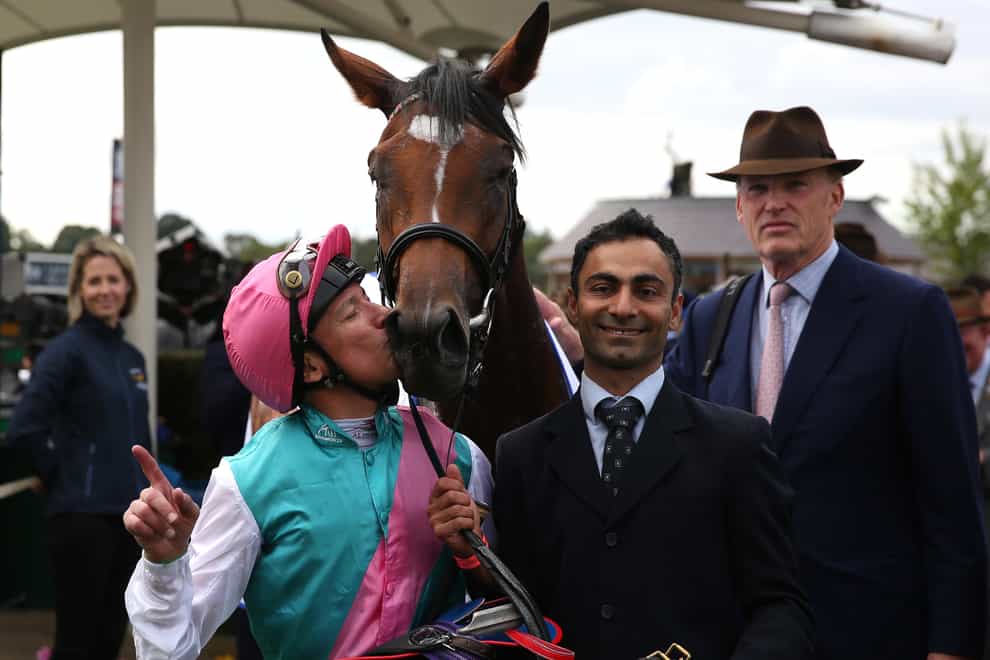 Frankie Dettori Kisses Enable after winning The Darley Yorkshire Oaks during Darley Yorkshire Oaks and Ladies Day of the Yorkshire Ebor Festival at York Racecourse