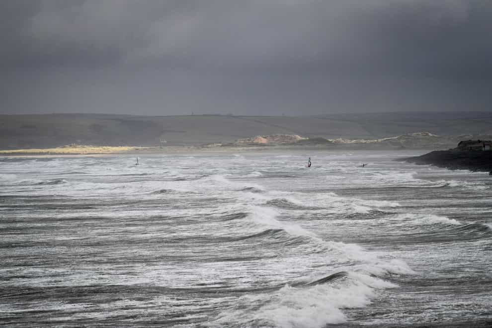 Windsurfers on the sea at Westward Ho! in Devon