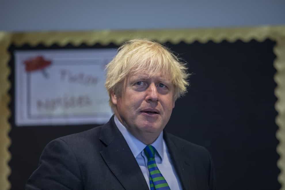 Prime Minister Boris Johnson as he tours Castle Rock school, Coalville, in the East Midlands