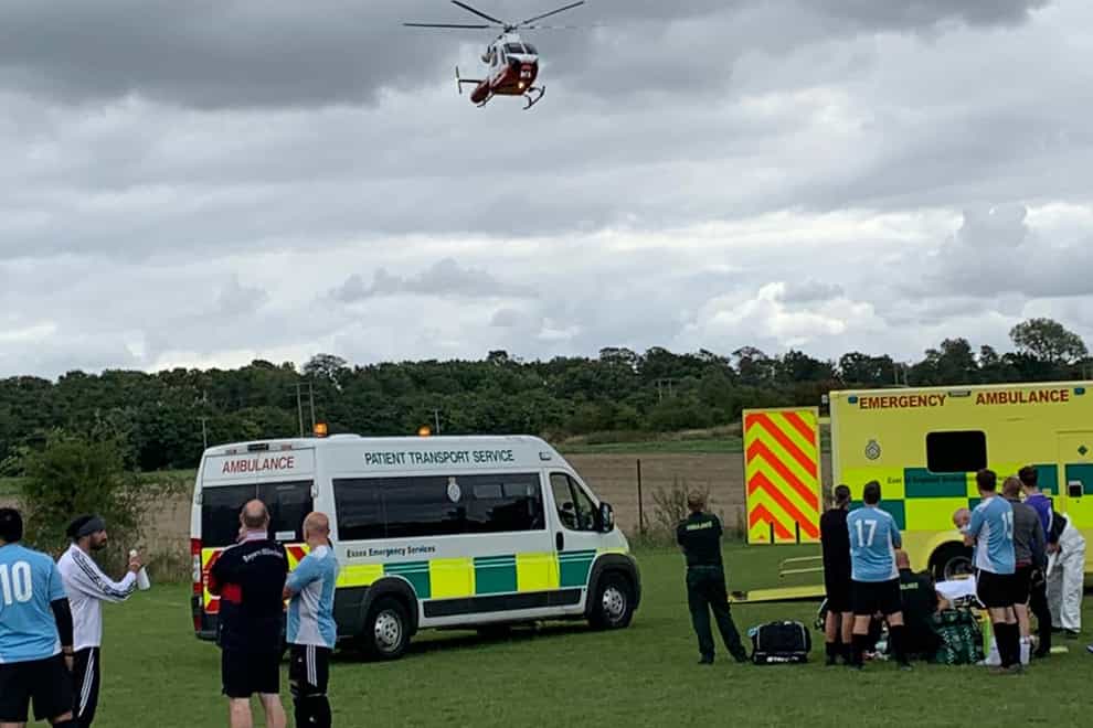 A helicopter arrives at the football pitch after a Sunday League footballer suffered a cardiac arrest