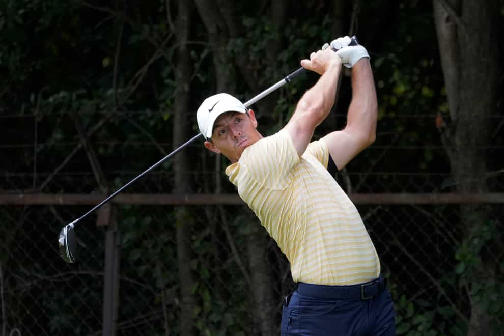 Rory McIlroy watches his tee shot