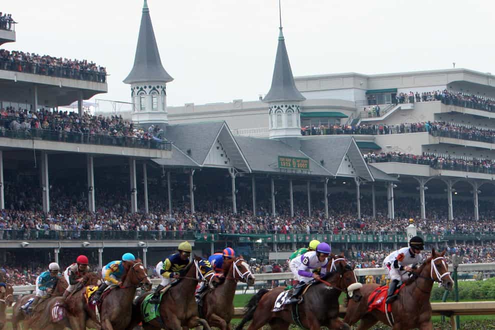 Runners thunder round the turn at Churchill Downs