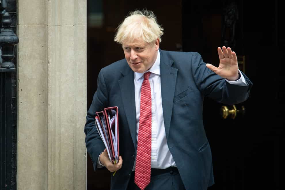 Prime Minister Boris Johnson departs 10 Downing Street ahead of PMQs