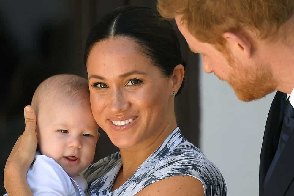 The Duchess of Sussex's legal claim over photos taken of her and son Archie in a Canadian park has reached the High Court (Toby Melville/PA)