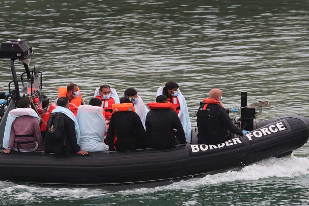 Group of people being taken to Dover
