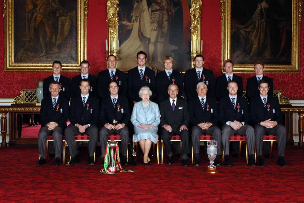 England’s 2005 Ashes winning team sit with Queen Elizabeth II and the Duke of Edinburgh in Buckingham Palace