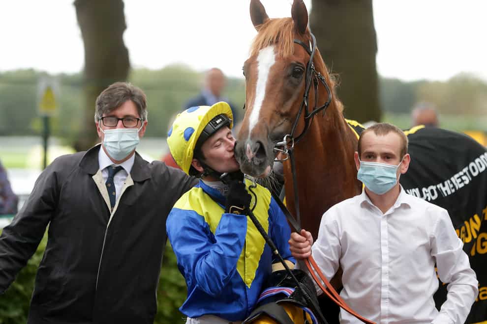 Oisin Murphy shows his appreciation to Dream Of Dreams after their victory in the Betfair Sprint Cup at Haydock (David Davies/PA)