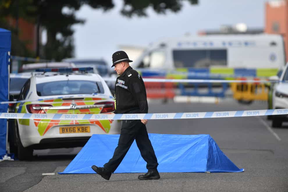 A police officer at a cordon in Irving Street, Birmingham