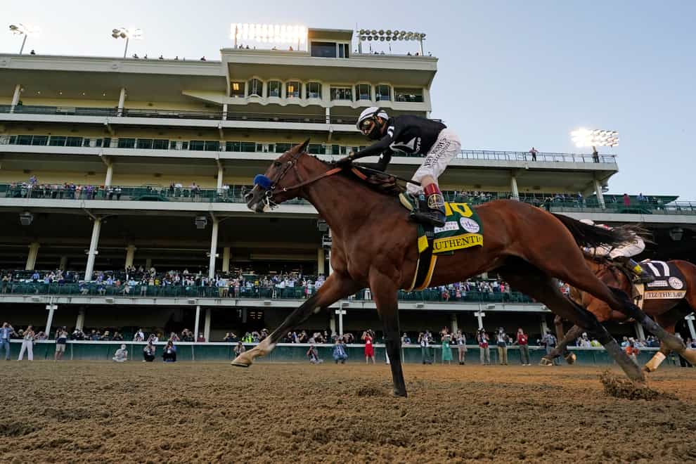 John Velazquez riding Authentic crosses the finish line to win the 146th running of the Kentucky Derby