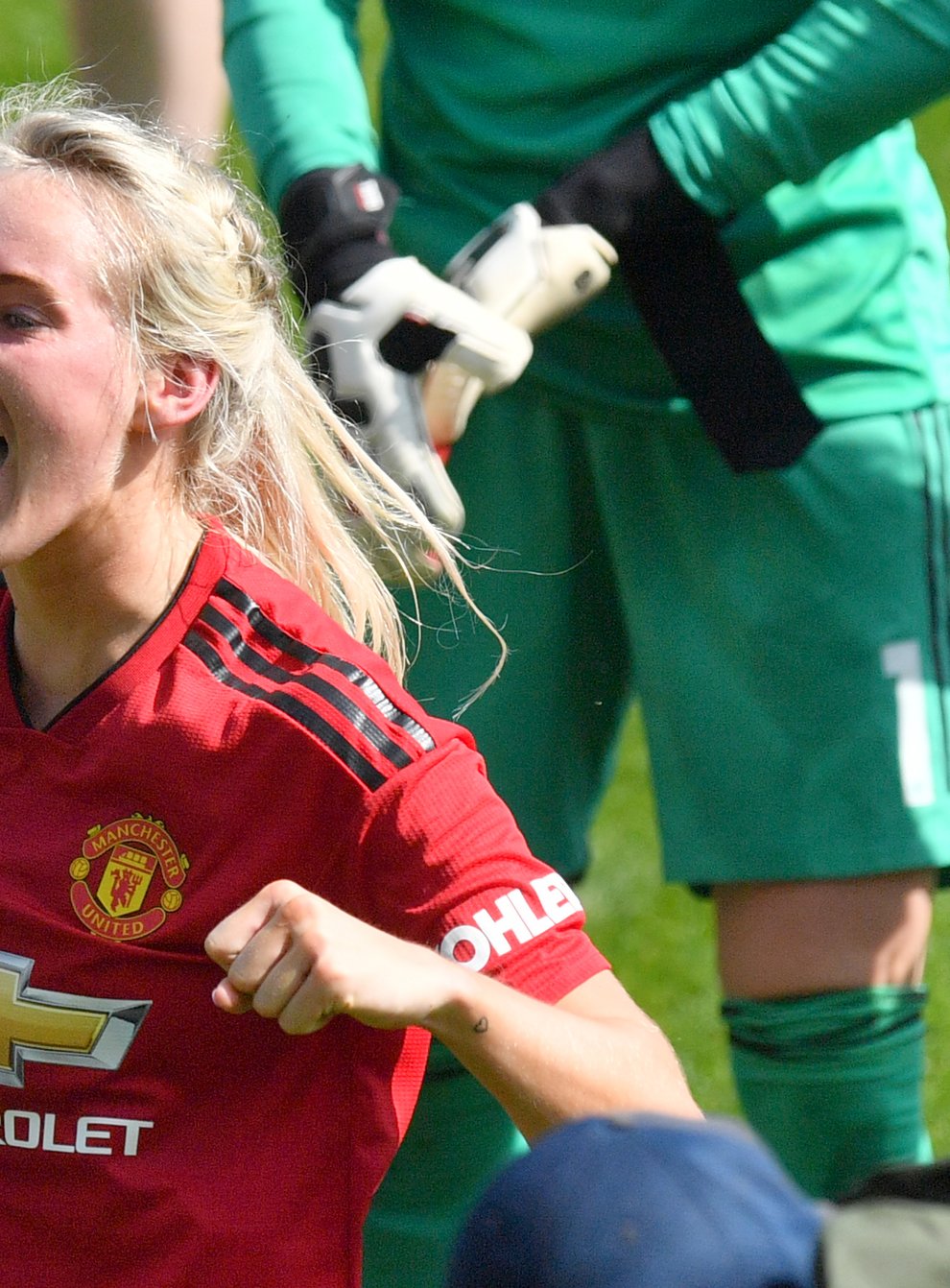 Turner earned her first England call-up on the same day as she signed her new deal with Manchester United