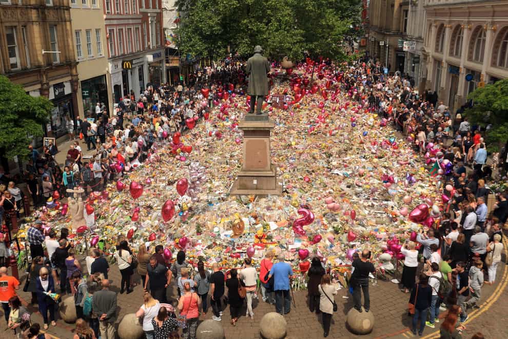 Flowers and tributes left in St Ann’s Square in Manchester after the terror attack
