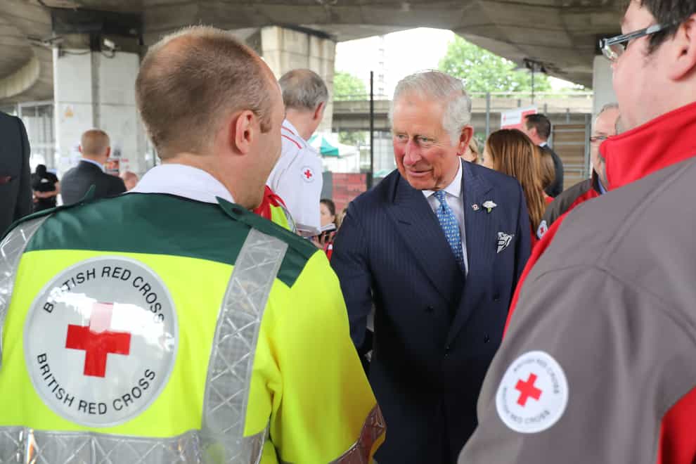 The Prince of Wales with Red Cross volunteers
