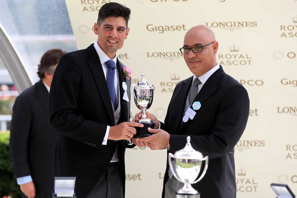Amer Abdulaziz receives a trophy at Royal Ascot from Sir Alastair Cook