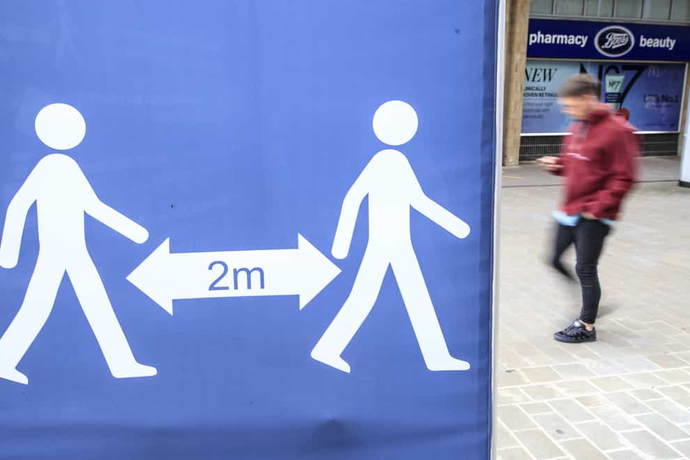 A social distancing sign in Leeds city centre