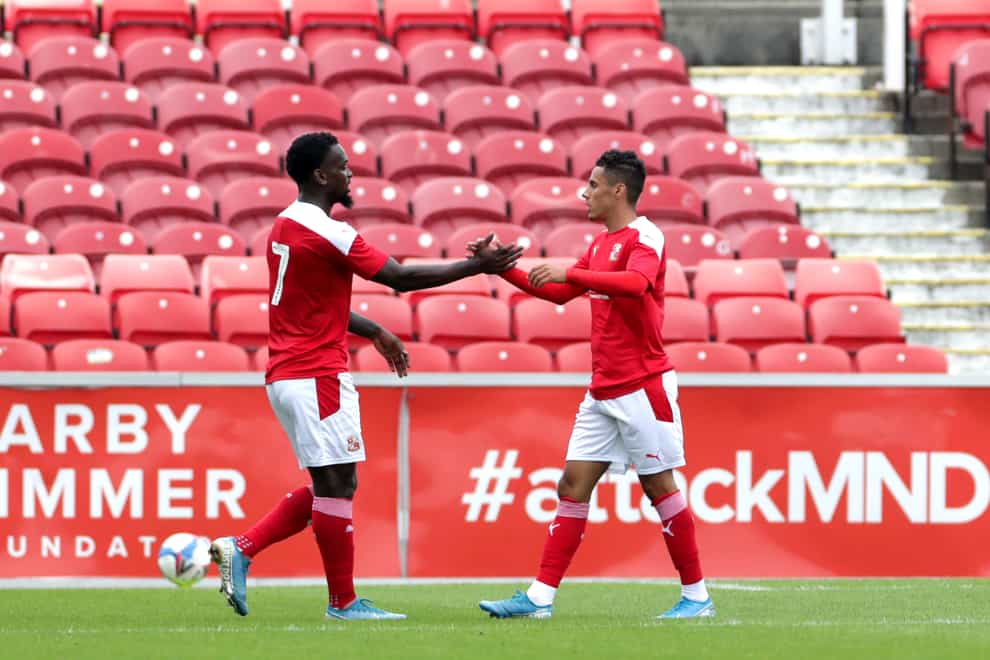 Tyler Smith (right) scored his first league goal for Swindon