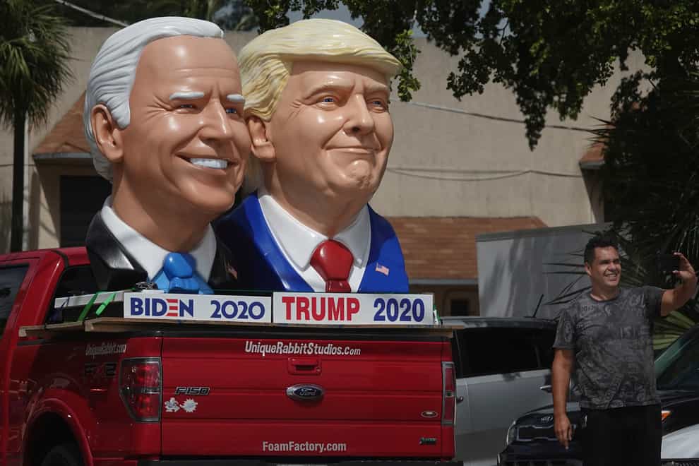 Foam sculpture depictions of President Donald Trump and Democratic presidential candidate former Vice President Joe Biden along Dixie Highway in Fort Lauderdale, Florida (Joe Cavaretta/South Florida Sentinel Sun/AP)