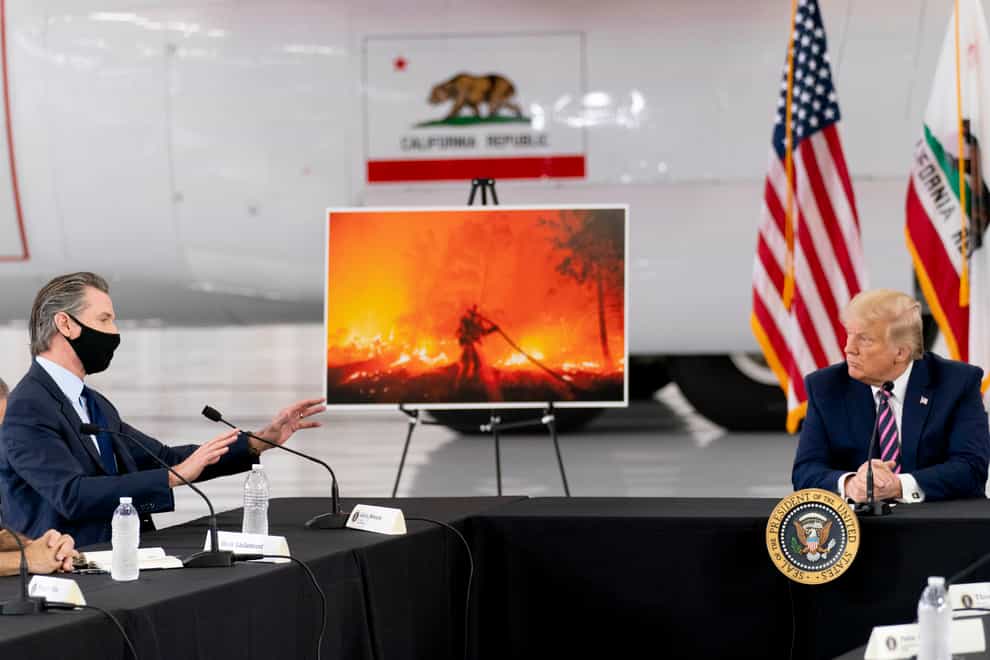 Donald Trump in a briefing on wildfires with California governor Gavin Newsom
