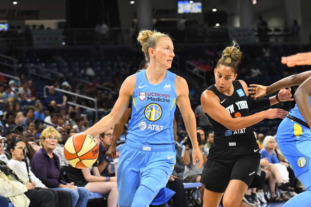 Courtney Vandersloot (left) has been the WNBA's assists leader for four consecutive seasons