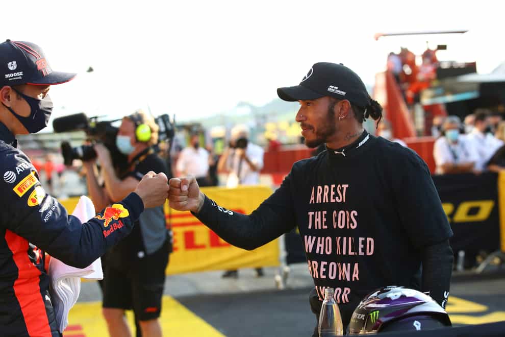 Mercedes driver Lewis Hamilton, right, wore a t-shirt in honour of Breonna Taylor at the Tuscan Grand Prix