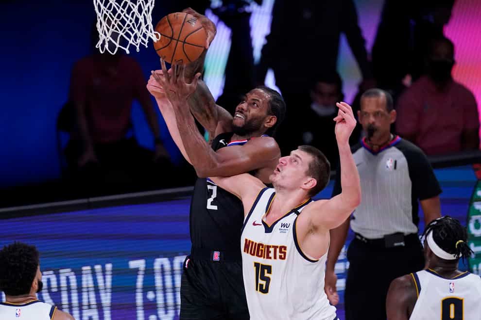 Kawhi Leonard, left, could not inspire the Los Angeles Clippers to a historic victory