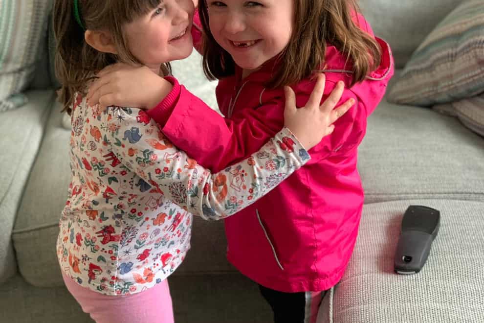 Amelia-Rose Walton, six (right), with little sister Chloe, five