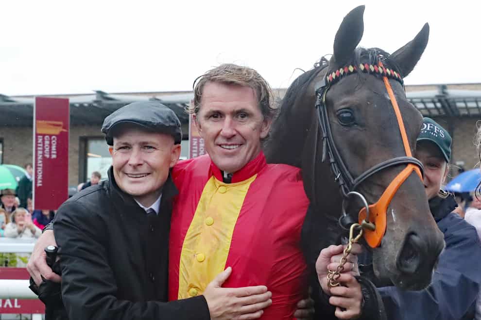 Pat Smullen congratulates Sir Anthony McCoy after his victory on Quizical in a charity race in aid of cancer trials at the Curragh last September