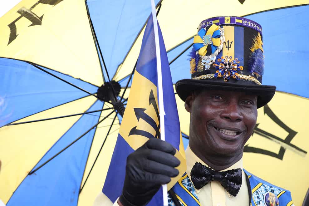 Barbadian Aidan Taylor, dressed in the national colours of his country, during a royal visit to the Commonwealth nation. Jane Barlow/PA Wire