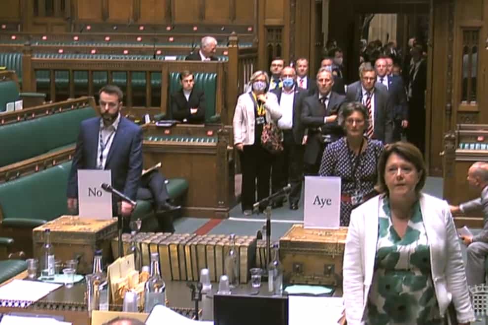 Screen grab from Parliament TV of social distancing measures appearing to be ignored in the House of Commons, after a technology failure forced them to join the “Mogg conga” to vote.