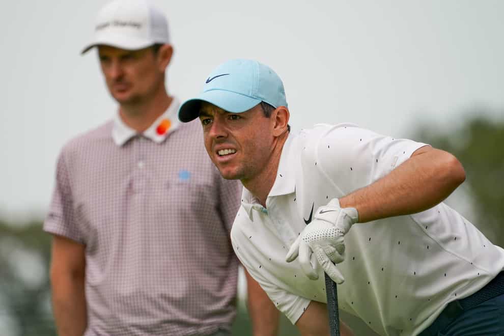 Rory McIlroy (right) carded an opening 67 in the US Open at Winged Foot