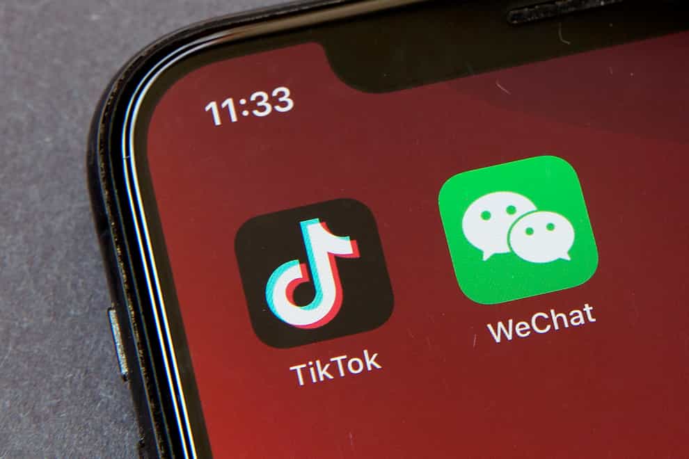 The WeChat icon on a smartphone