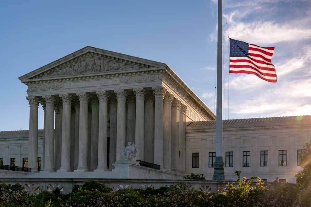 The flag flies at half-mast at the Supreme Court following the death of Justice Ruth Bader Ginsburg (J. Scott Applewhite/AP)