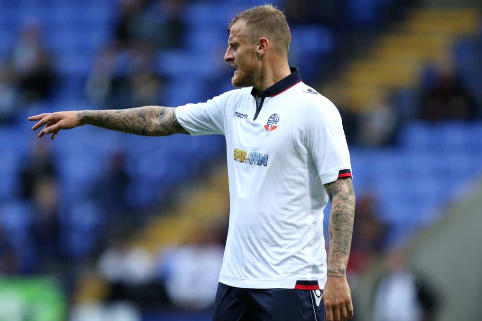 The agent of David Wheater and Gary Woods claims the players are being forced out of Oldham