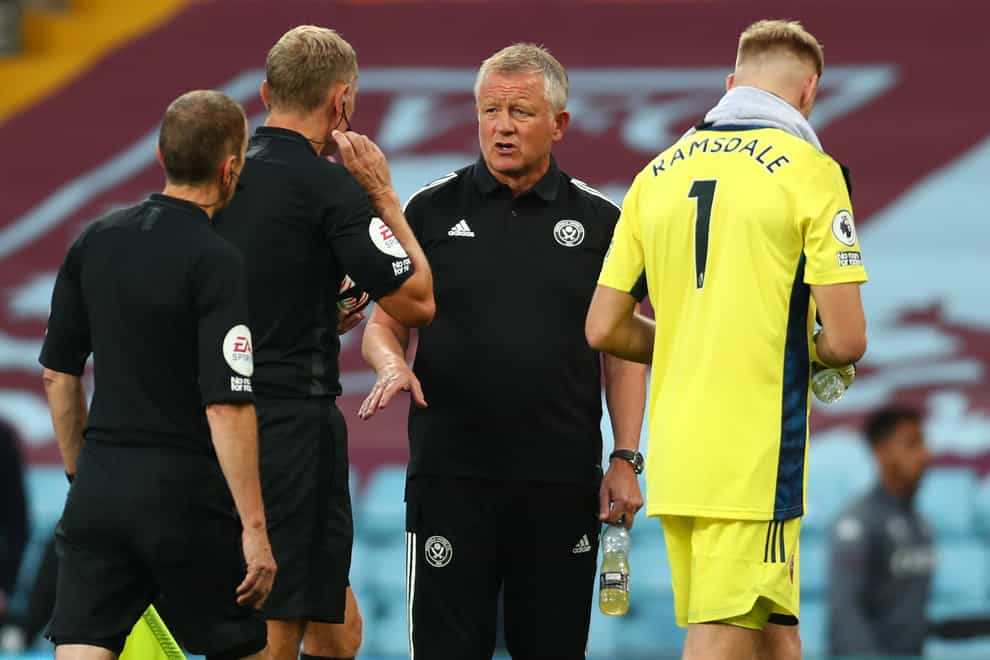 Sheffield United manager Chris Wilder speaks with referee Graham Scott